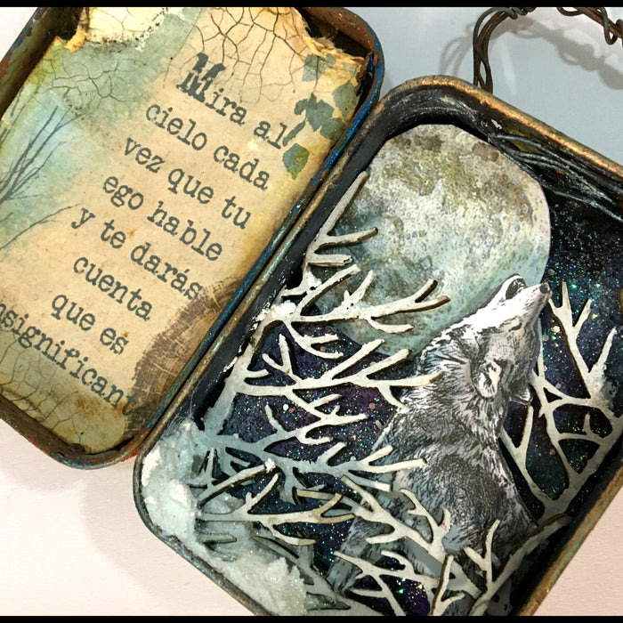 The inside of the altered tin by LOUISE CROSBIE