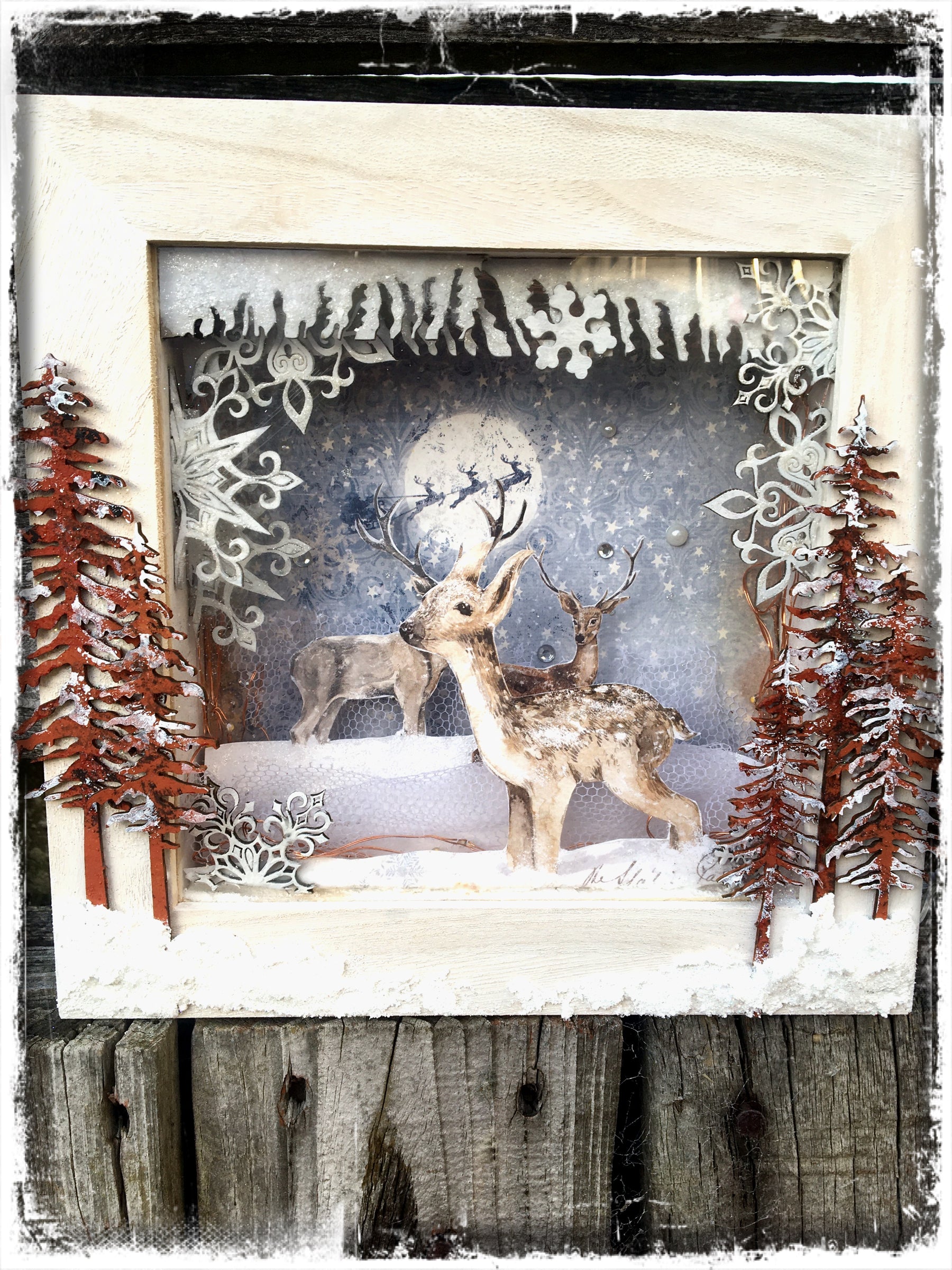 Winter woodland night light by LOUISE CROSBIE
